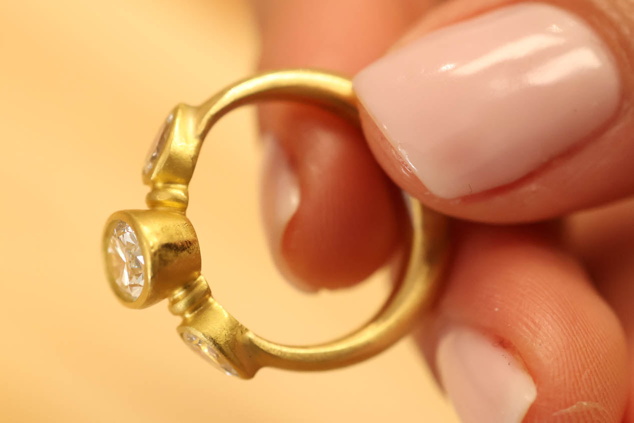 22K & 20K Brilliant Oval Diamond Ring with Diamond Pear Shape Side Stones