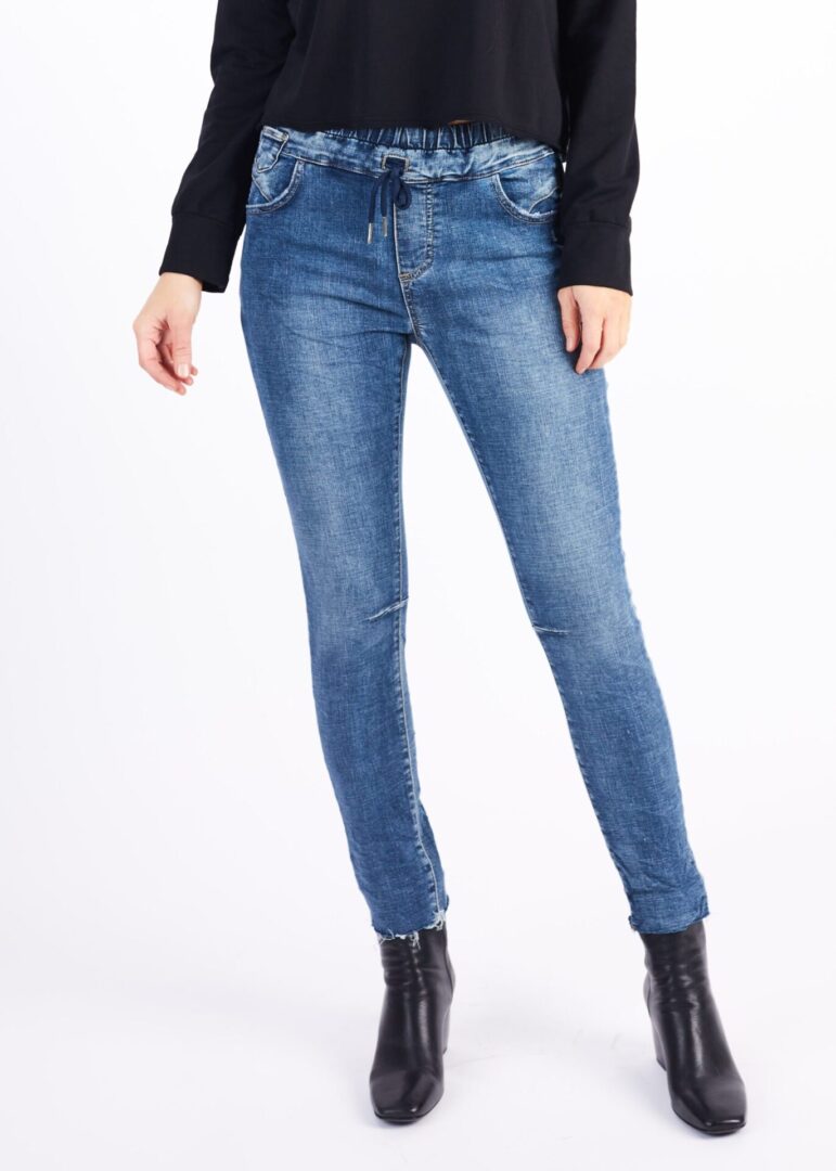 A Woman in a Skinny Fit Blue Color Jeans