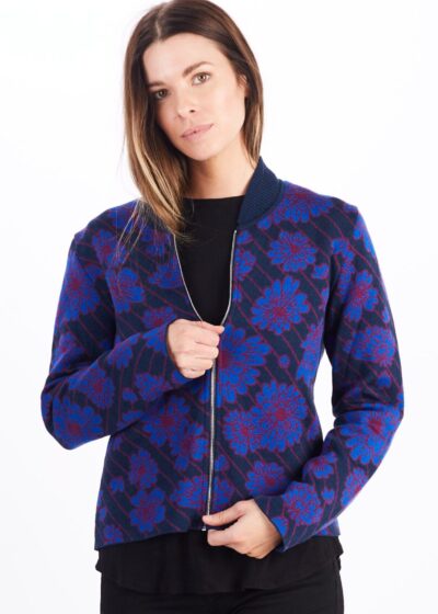 A Woman in a Blue Flower Pattern Front Zipper Sweater