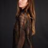 A Woman in a Black Color Shear Top
