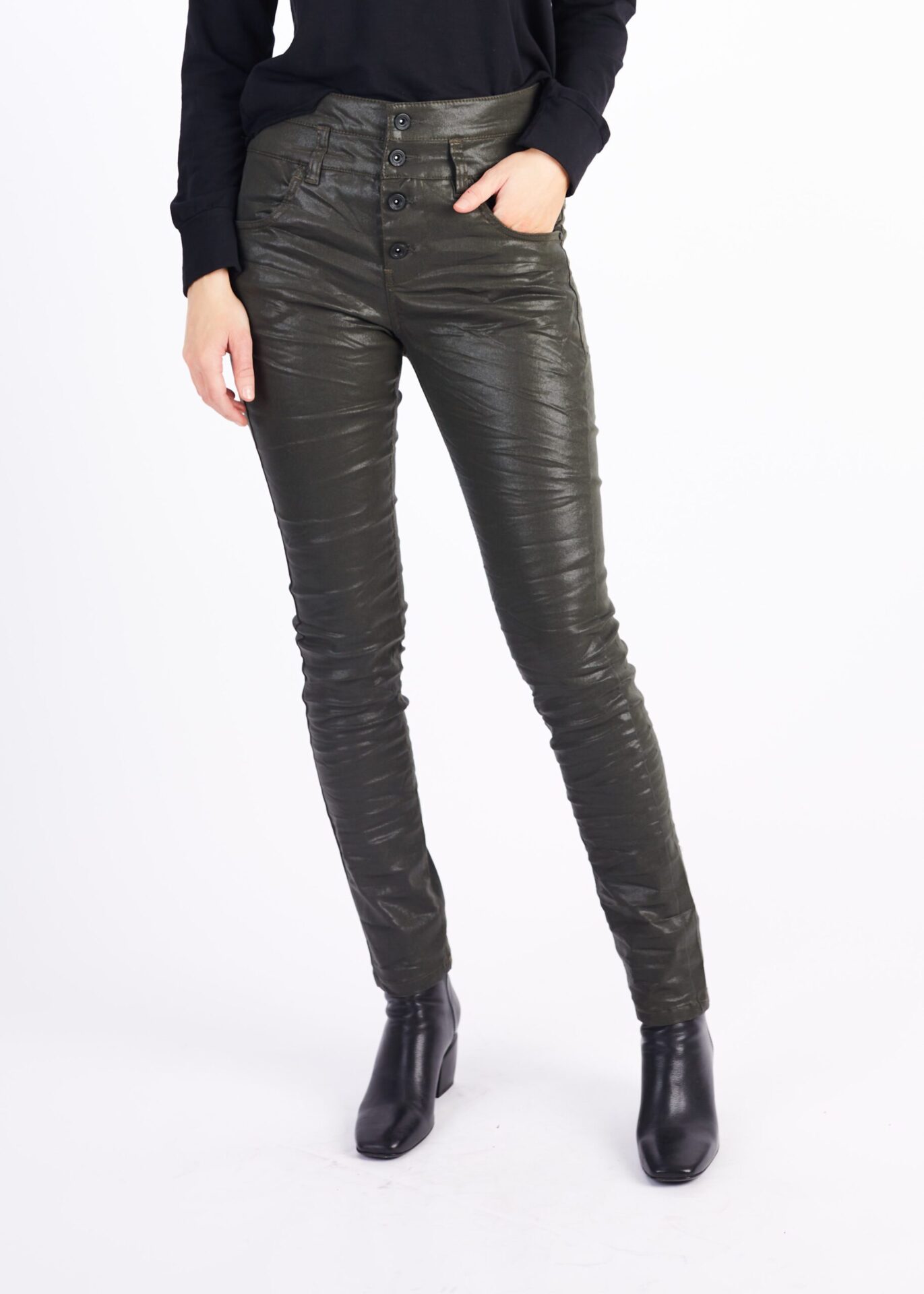 A Woman in a Tight Black Color Leather Pants