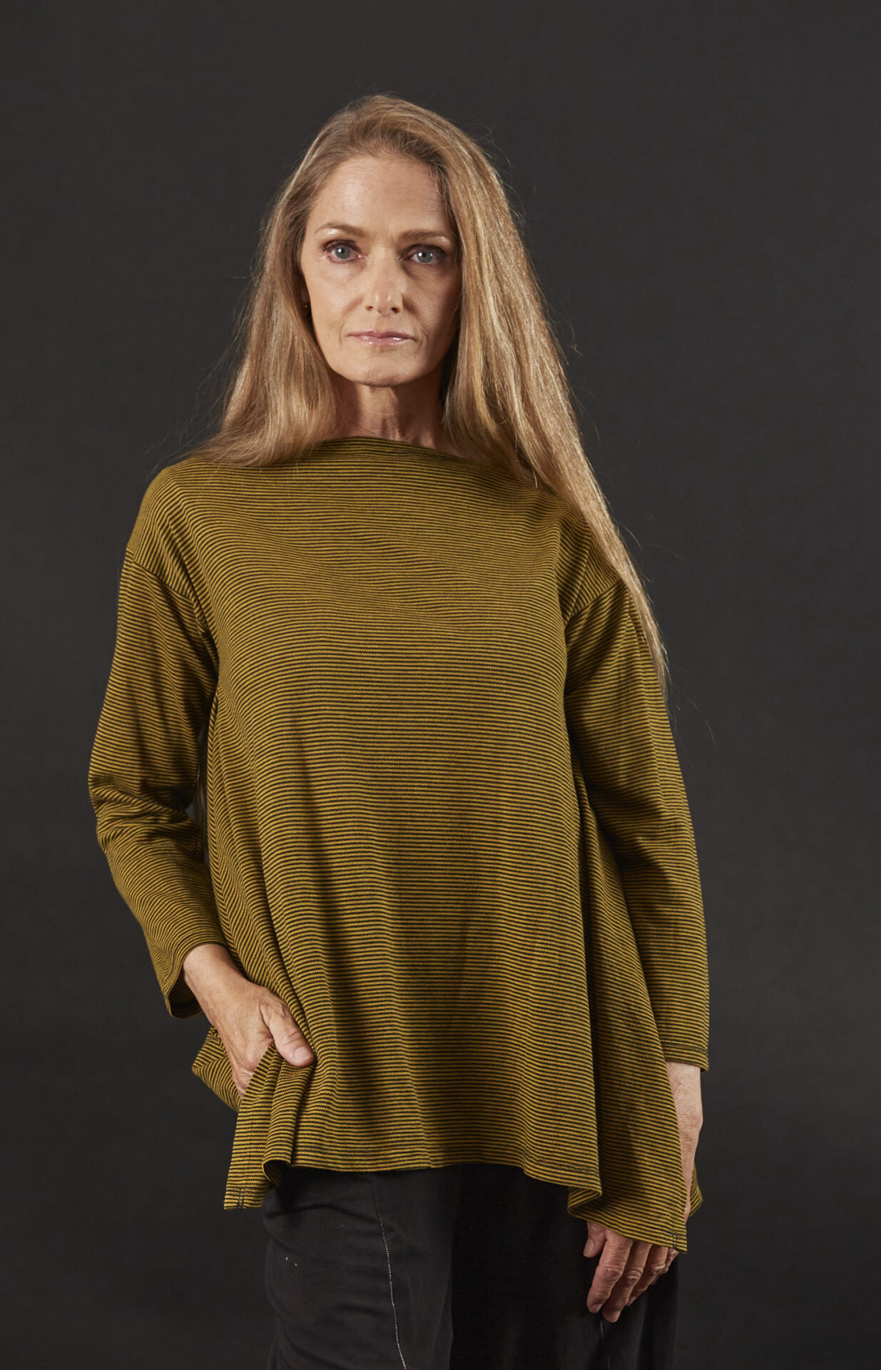 A Woman in a Brown Color Sweater Full Sleeves