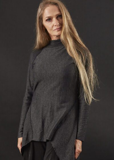 A Woman in a Gray Color Asymmetric Top