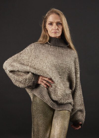 A gray color sweater with a black background