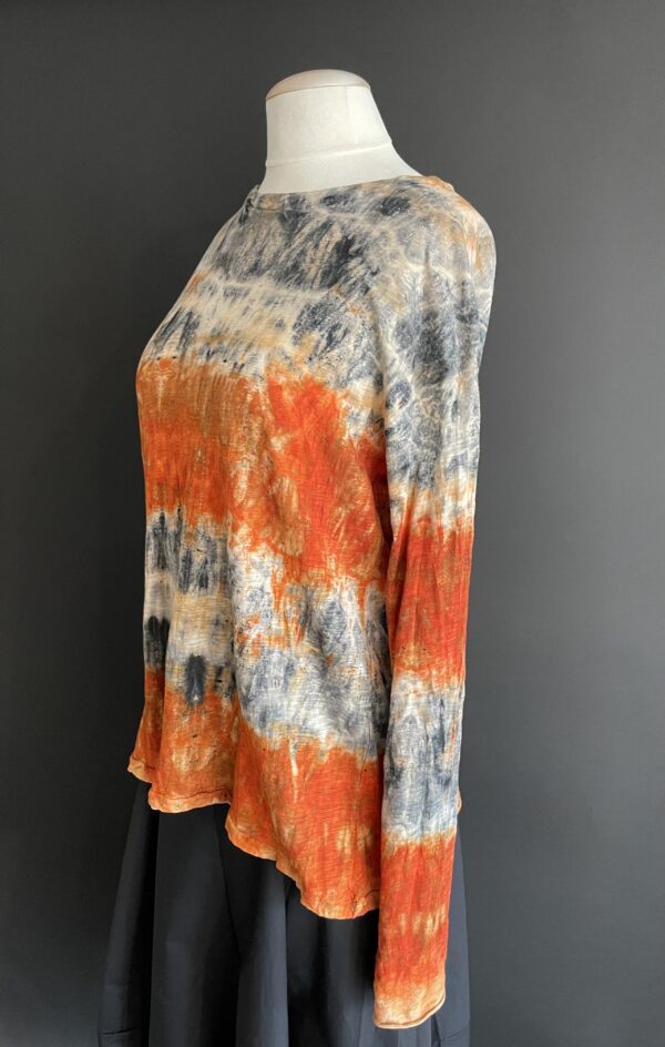 Cream Color Top With an Orange Stripe