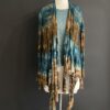 A Shrug With a Brown and Teal Shrug