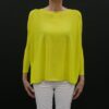 A Loose Yellow Color Sweater With Full Sleeves