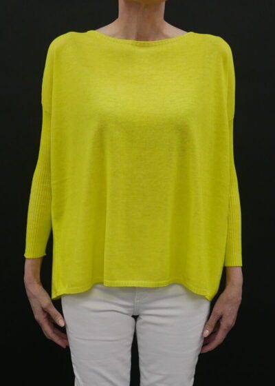 A Loose Yellow Color Sweater With Full Sleeves