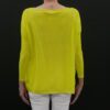 A yellow color top with a black background from back