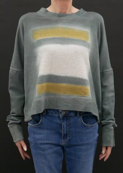 A Grey Color Sweater With White and Yellow Stripes