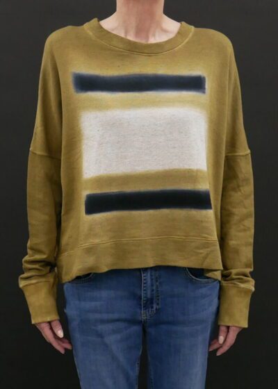 A Woman in an Olive Green Full Sleeve Sweater