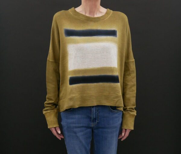 A Woman in an Olive Green Full Sleeve Sweater