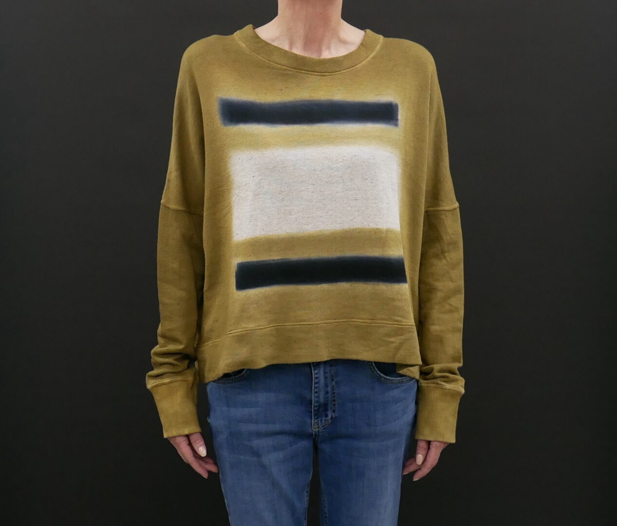 A Woman in an Olive Green Full Sleeve Sweater