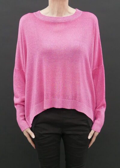 A Woman in a Loose Pink Full Sleeve Sweater