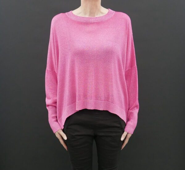 A Woman in a Loose Pink Full Sleeve Sweater