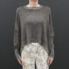 A brown color full sleeves top and a black background