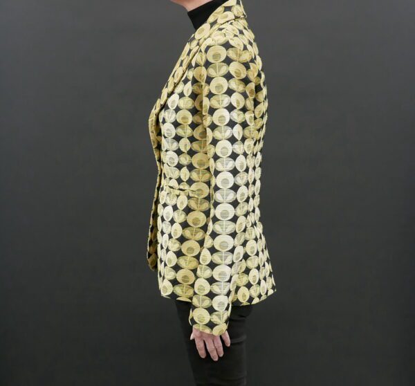 Woman in a Yellow Detail on a Black with black background