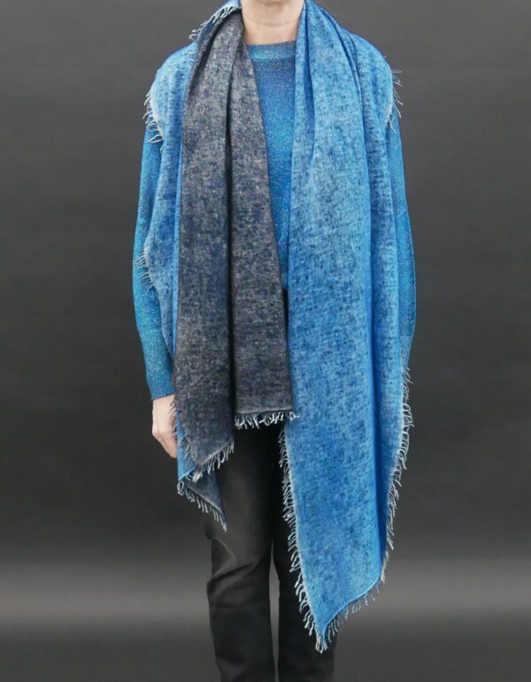 A Woman in a Blue and Gray Color Scarf