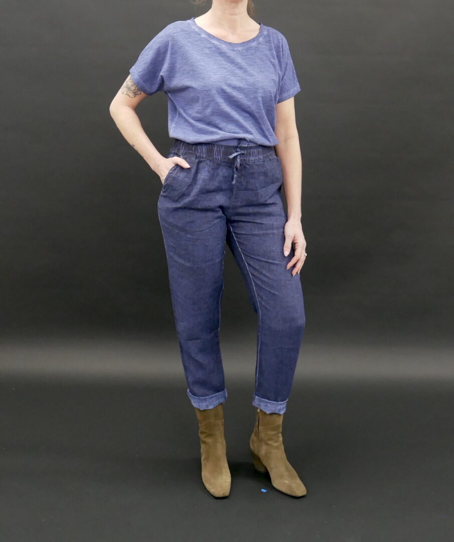 A Woman Wearing a Loose High Waist Jeans