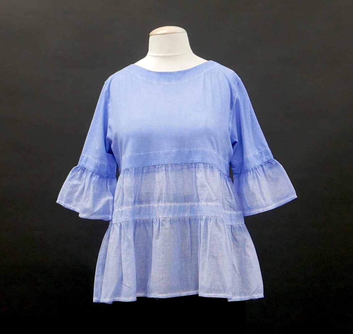 A Blue Color Top With a Pleated Hem